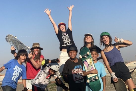 girls celebrating at skatepark